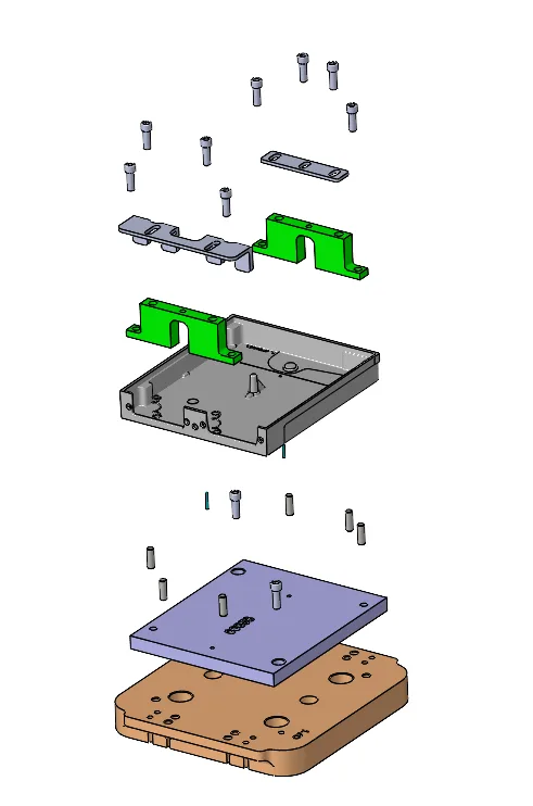 Exploded view of the secondary operation fixture, showing the base plate, riser, locating blocks, clamps and fasteners