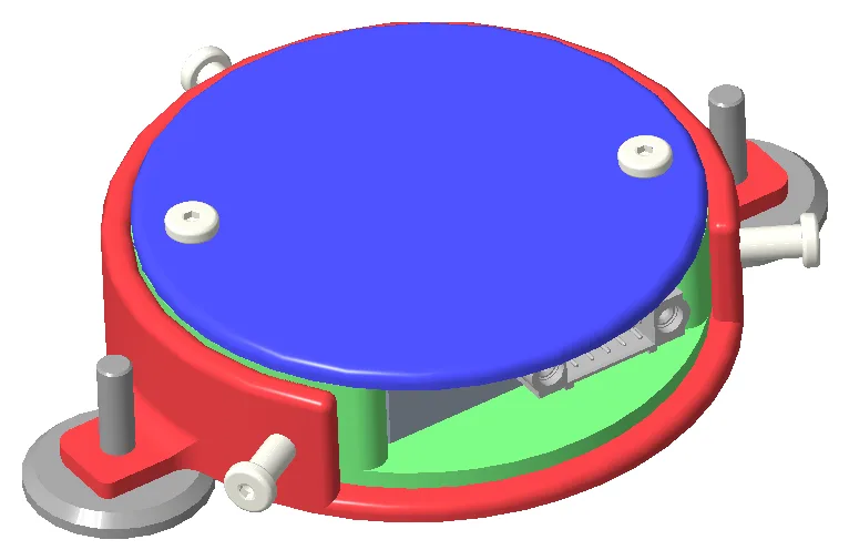 CAD render of the circular VNAV enclosure, closed — a blue lid over a green tray, held in a red carrier ring with three isolator-mounted feet